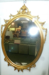 OVAL GILT FRAMED BEVELED MIRRO