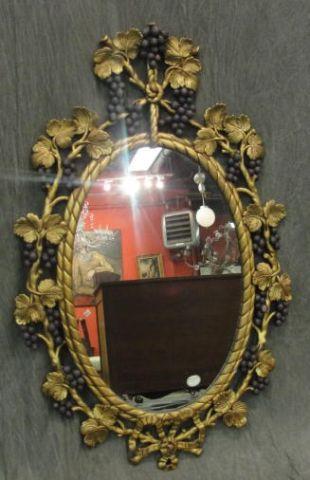 Oval Gilt Mirror with Vine Trim.