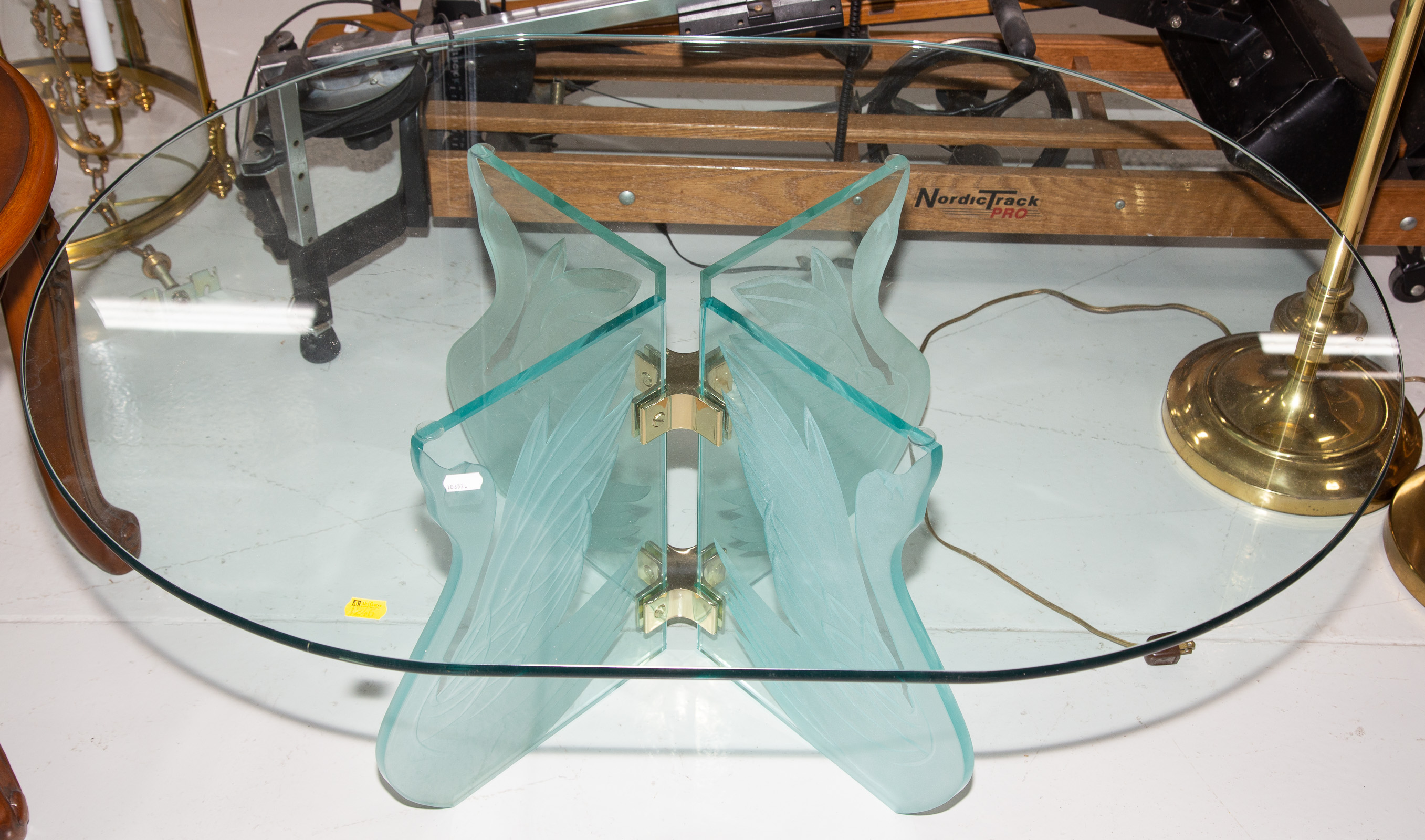 OVAL GLASS COFFEE TABLE Four