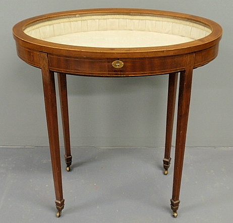 Oval mahogany curio table late 19th