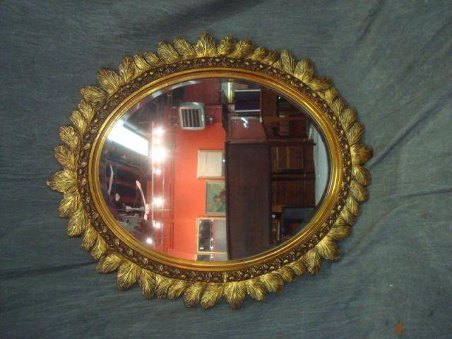 Oval Mirror with Giltwood Leaf Form