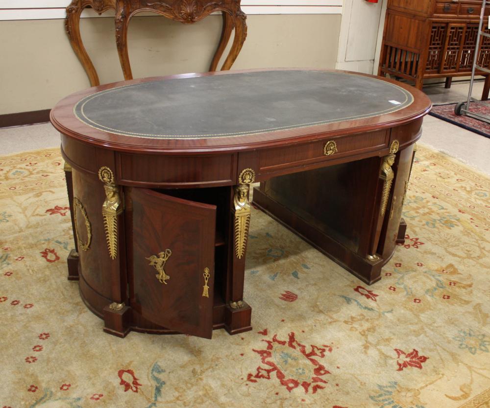 OVAL ORMOLU-MOUNTED MAHOGANY