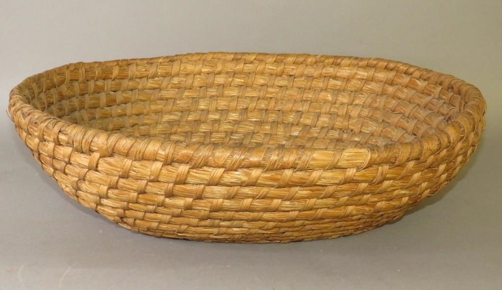 OVAL RYE STRAW BASKET ATTRIBUTED TO