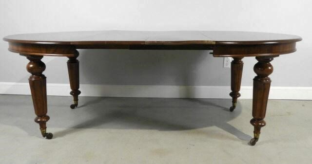 OVAL WALNUT DINING TABLE,