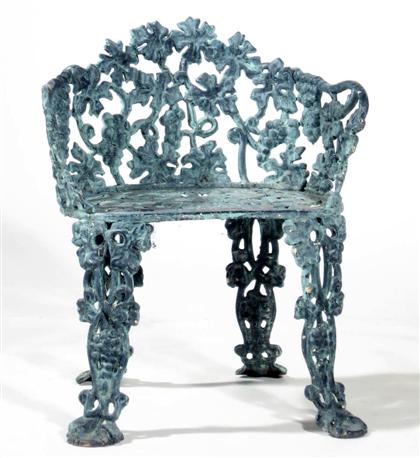 Painted cast iron arm chair    Cast