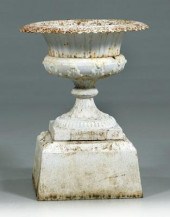 Painted cast iron garden urn,