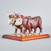 PAINTED CAST IRON OXENA pair o