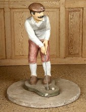 PAINTED CAST S TONE GOLFER FIG