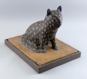 PAINTED CEMENT SCULPTURE OF A