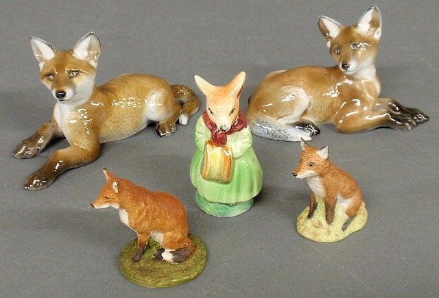 Painted ceramic seated fox signed
