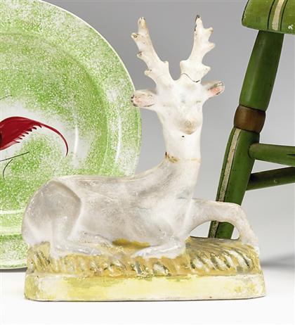 Painted chalkware kneeling figure