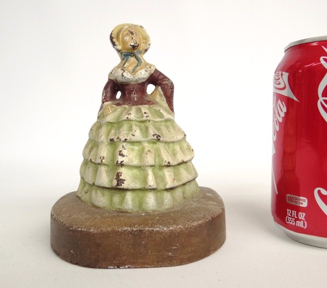 Painted lady in dress doorstop. 6''