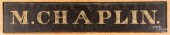 PAINTED M. CHAPLIN TRADE SIGN,