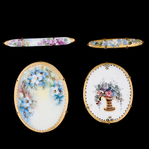 Painted porcelain brooches and