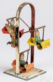PAINTED TIN CLOCKWORK FERRIS W