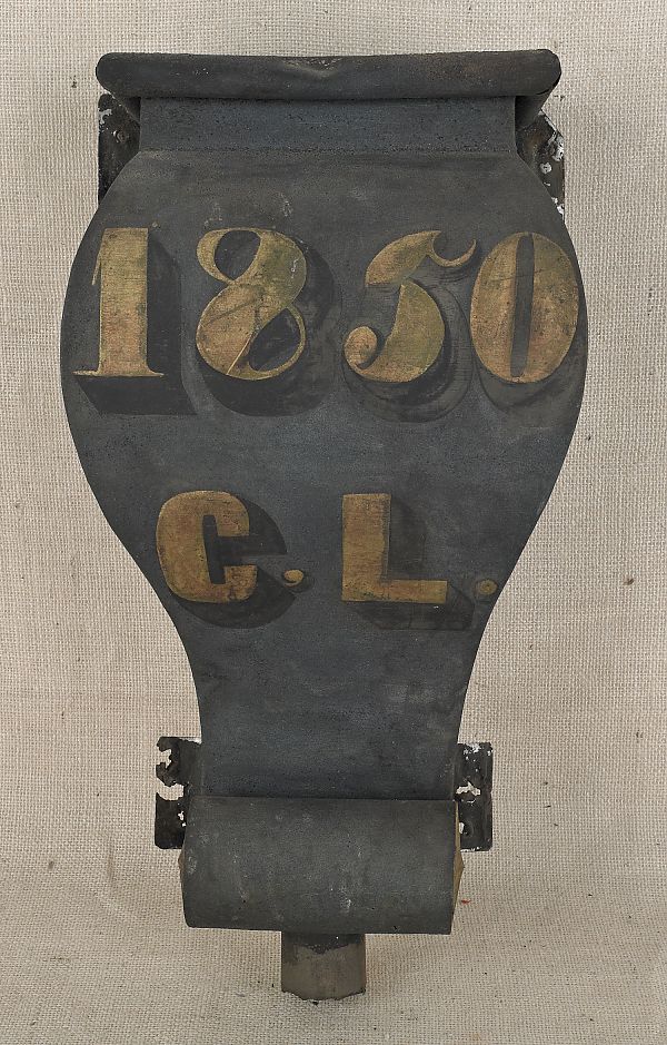 Painted tin downspout inscribed