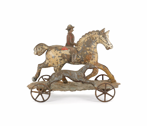 Painted tin horse and rider with