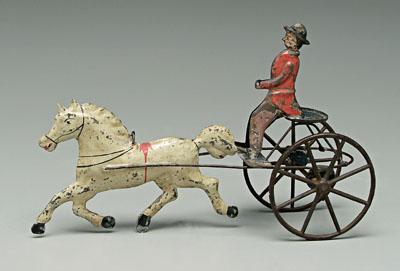 Painted tin horse and rider push
