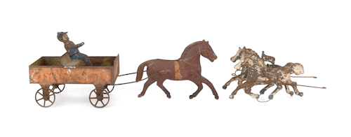 Painted tin horse drawn wagon