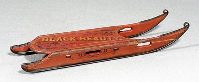 Painted wood and iron sled,