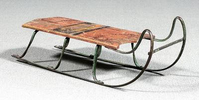 Painted wood and iron sled,