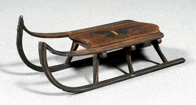 Painted wood and iron sled,