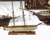 Painted wood model of a fishin