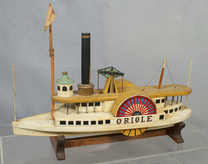 Painted wood pull toy model of a
