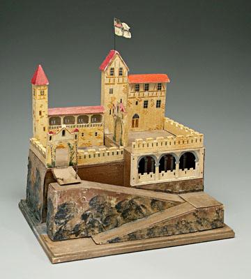Painted wooden toy castle,
