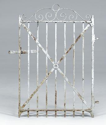 Painted wrought iron gate, scrolled