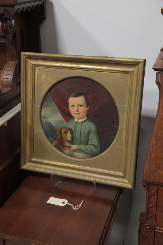 PAINTING OF A BOY AND DOG. Oil on