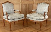 PAIR 19TH C. CARVED WALNUT FAU
