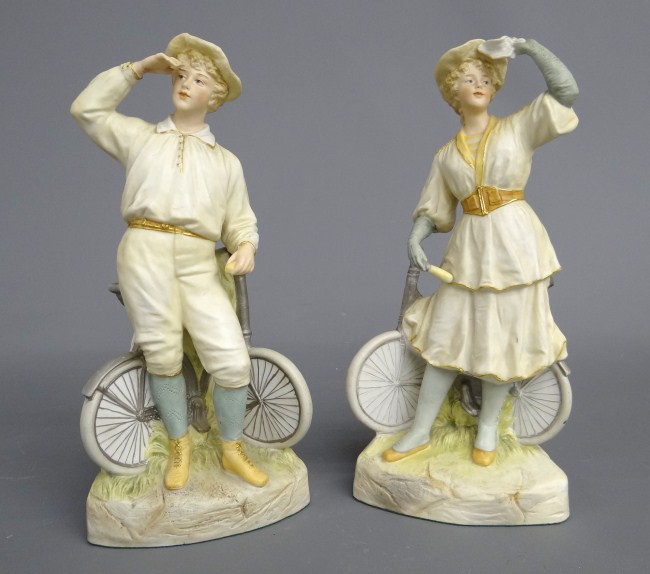 Pair 19th c. Heubach bisque cyclist