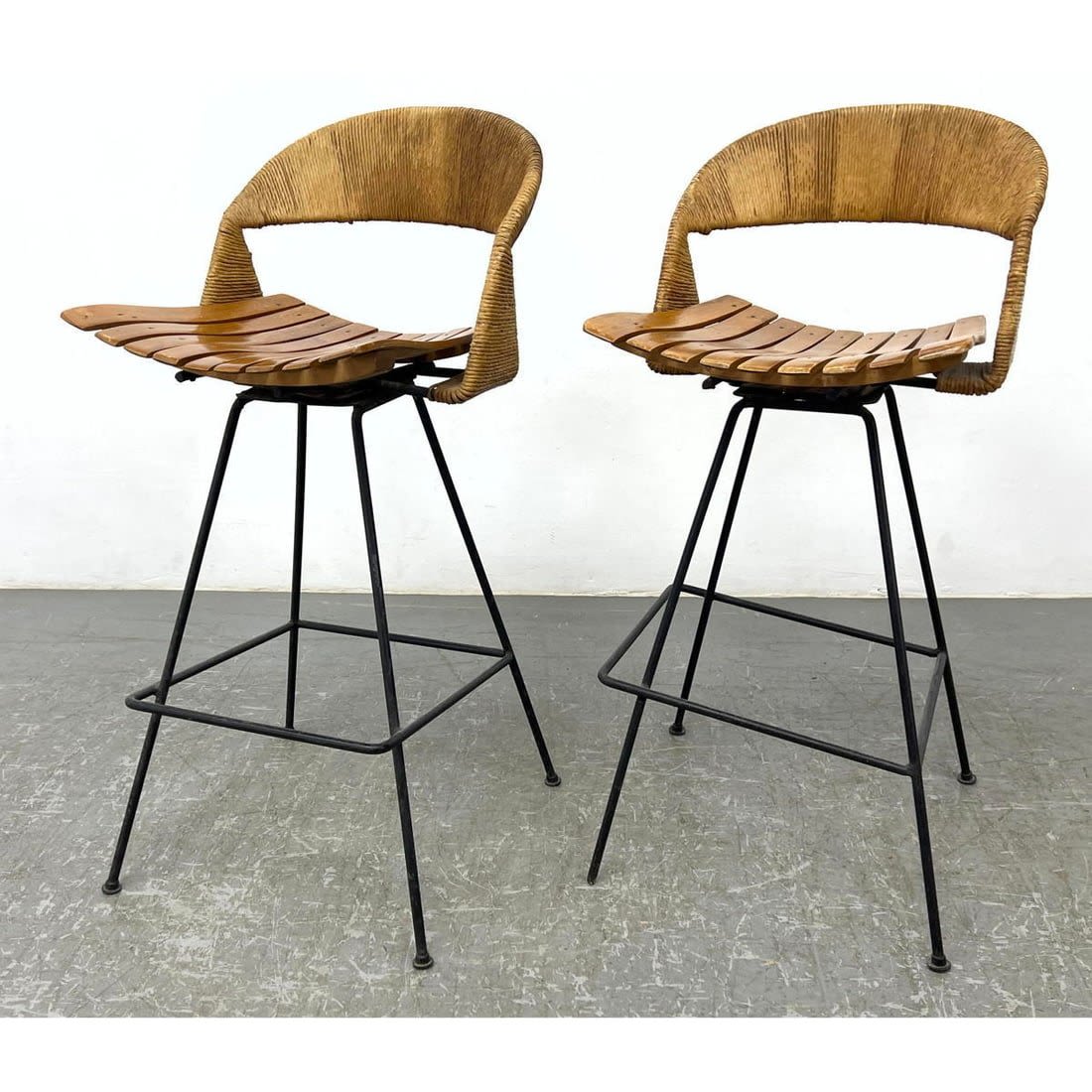 Pair Arthur Umanoff bar stools.
