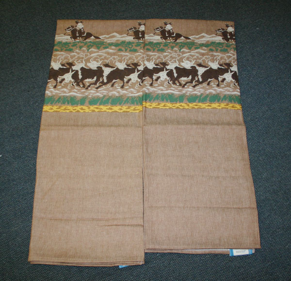 Pair Bates vintage cowboy cattle