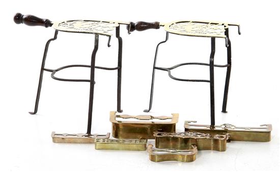 Pair brass and iron trivets and