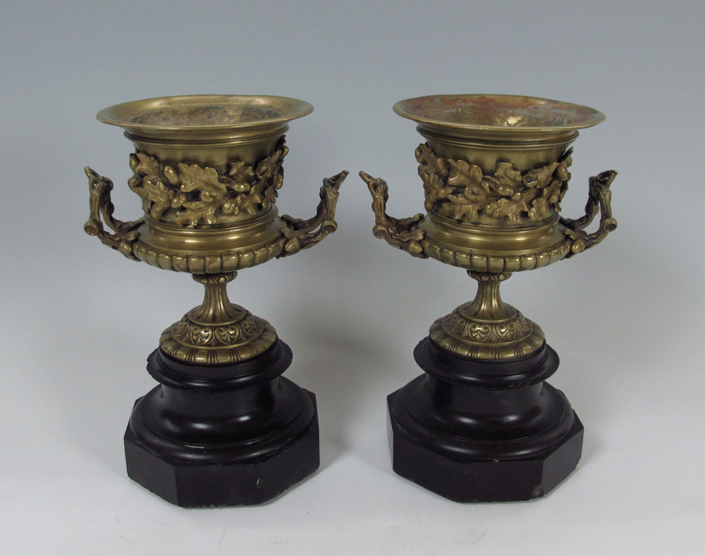 PAIR BRONZE URNS: The raised design