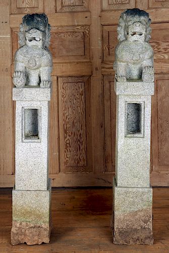PAIR CARVED GRANITE POSTS WITH