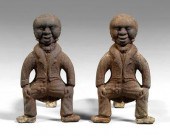 Pair cast iron andirons: Afric