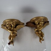 PAIR CHERUB-FORM GILT BRACKETS