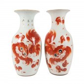 PAIR CHINESE IRON RED BUDDHIST
