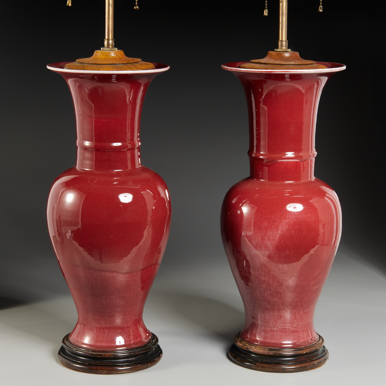 PAIR CHINESE OXBLOOD PHOENIX-TAIL