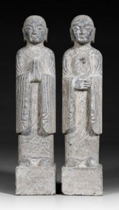 Pair Chinese stone lohans: car
