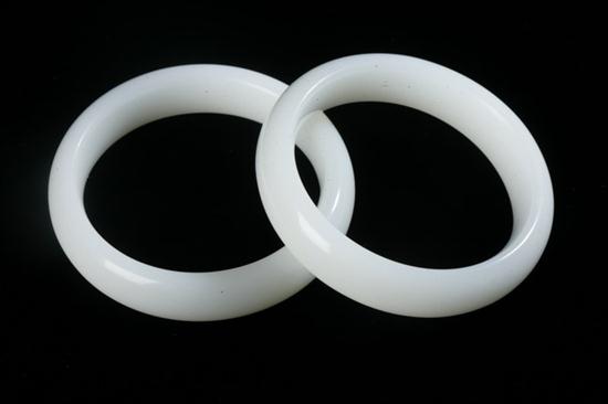 PAIR CHINESE WHITE JADE BANGLES.