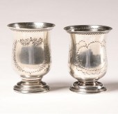 Pair coin silver cups; fair tr