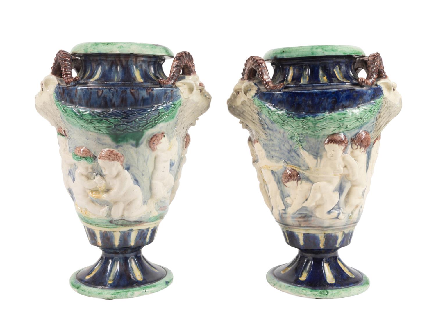 PAIR CONTINENTAL MAJOLICA URNS W/
