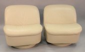 PAIR DIRECTIONAL LEATHER SWIVE