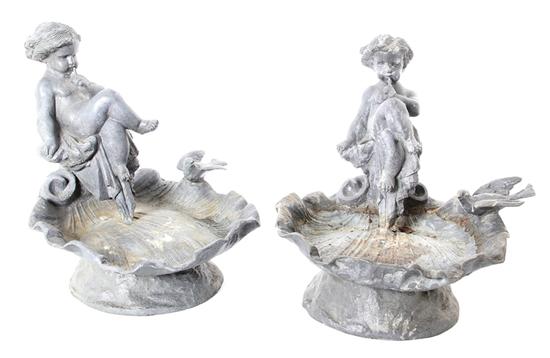 Pair English lead birdbaths by H.