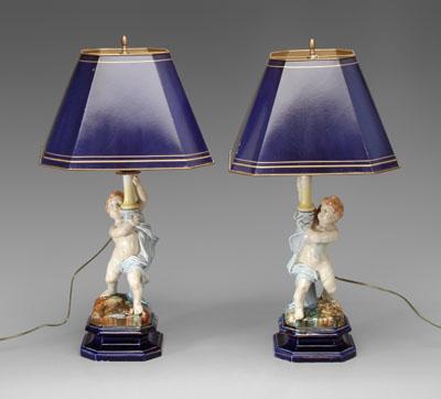 Pair figural lamps: each with putto