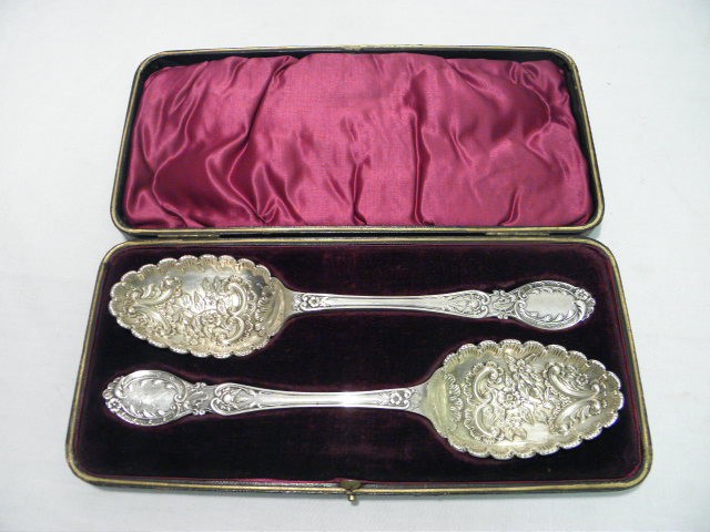 Pair floral heavy sterling silver